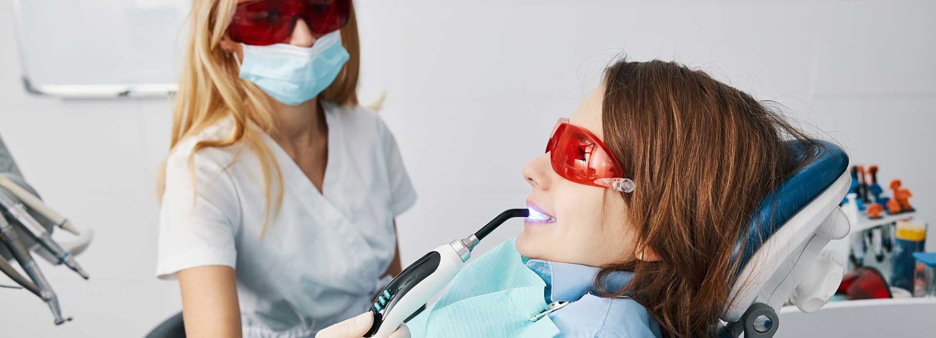 A patient getting dental sealant treatment at the dentist